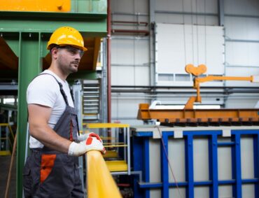 portrait-male-factory-worker-leaning-metal-railings-industrial-production-hall_342744-86 portrait-male-factory-worker-leaning-metal-railings-industrial-production-hall_342744-86